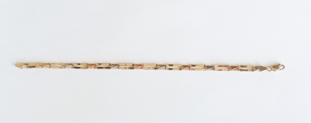 Kettingen en Armbanden - Tricolor gouden schakelarmband